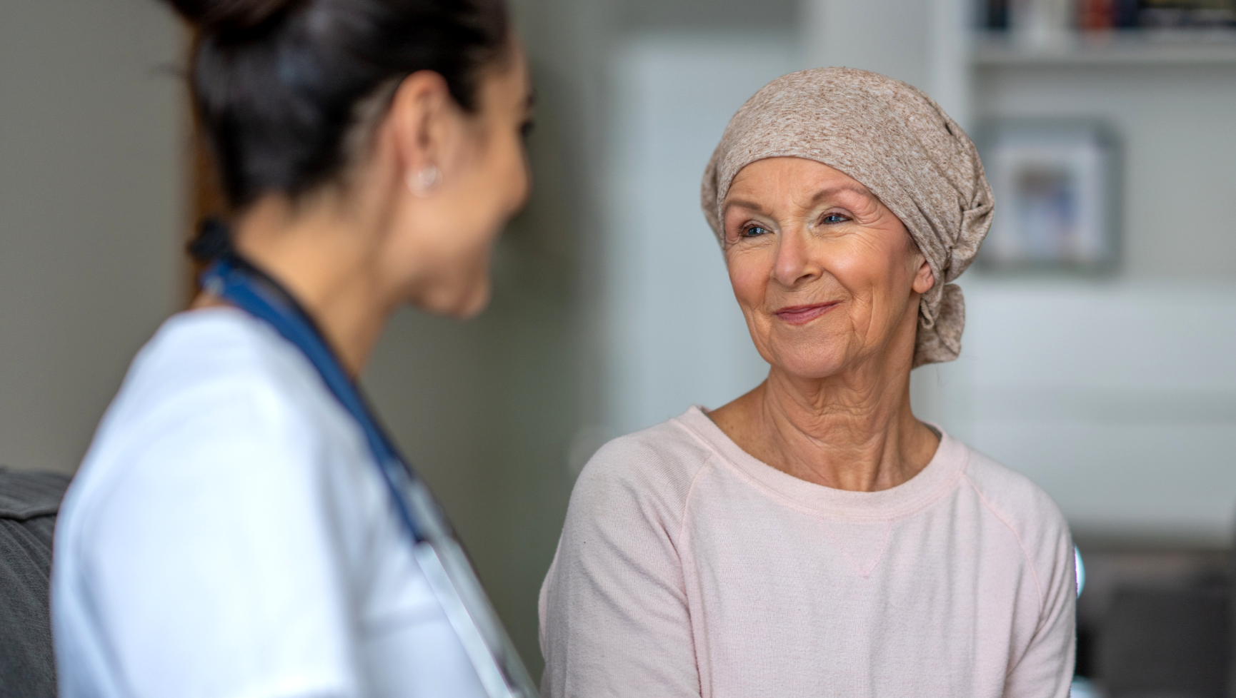Cancer patient consulting with doctor